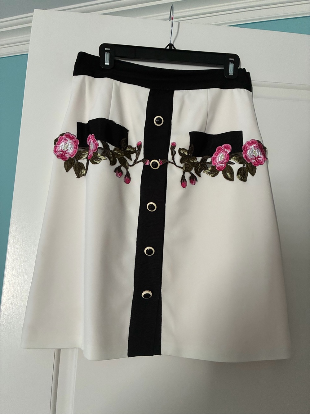 Beulah White A-Line Skirt with Black Trim and Pink Rose Embroidery